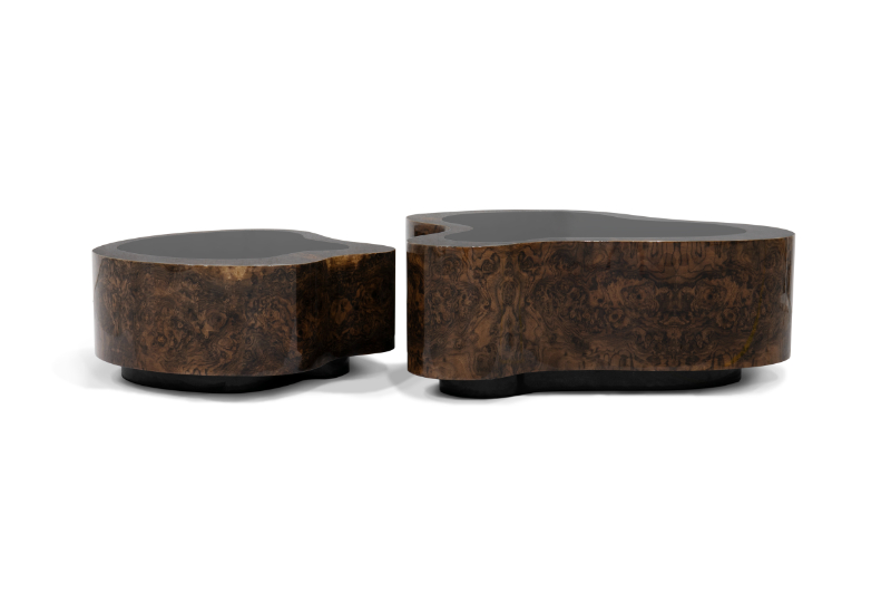 a modern coffee table with a wave shape design in walnut and black mirror in the top